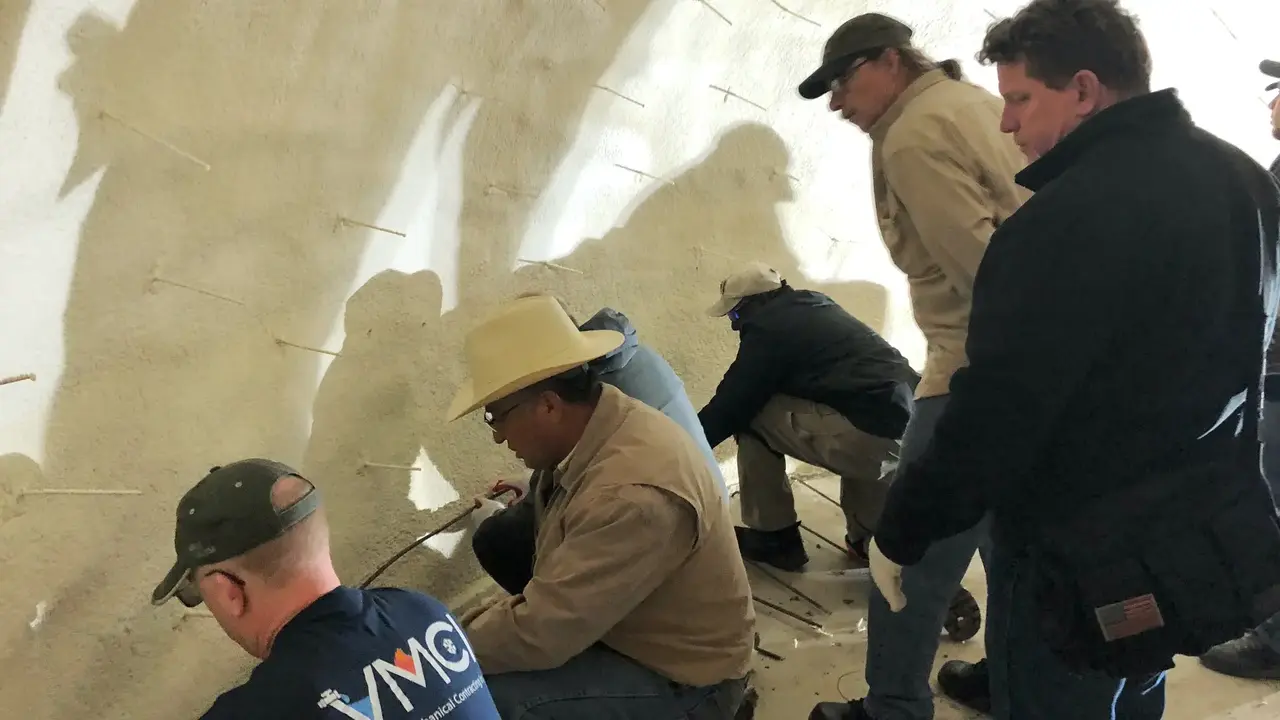 Tying rebar Tying rebar.