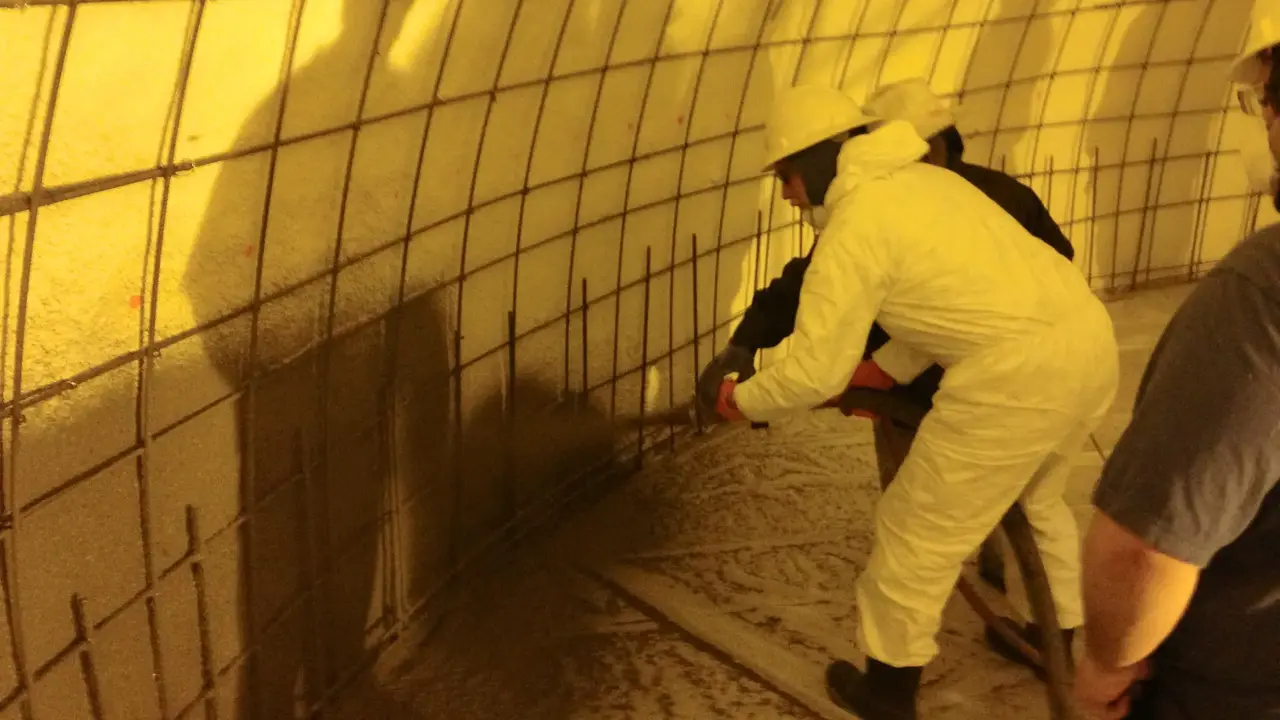 Spraying shotcrete Spraying shotcrete.