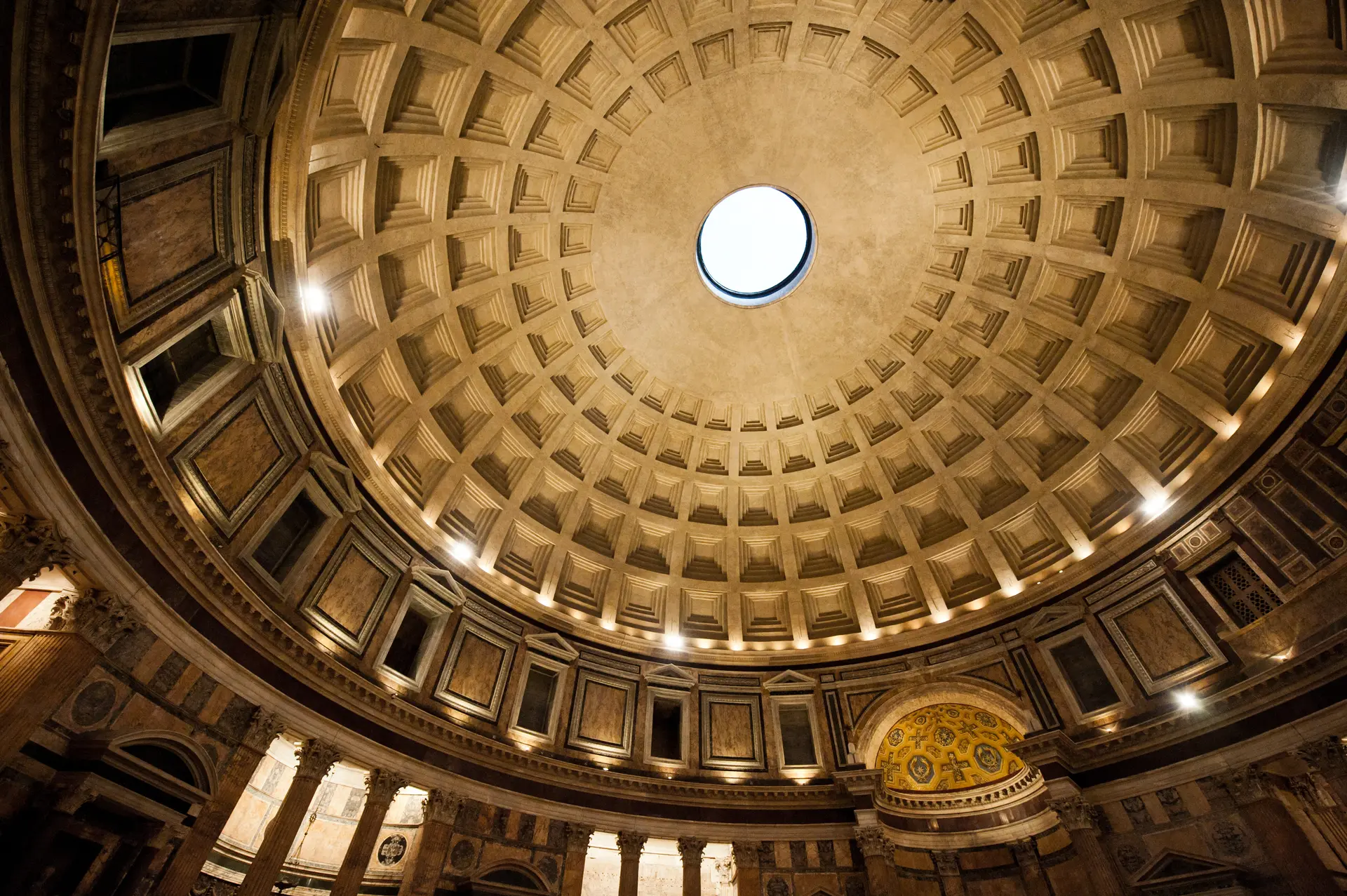 The Oculus in Massive Concrete Dome lights the Rotunda Below The Oculus in Massive Concrete Dome lights the Rotunda Below.