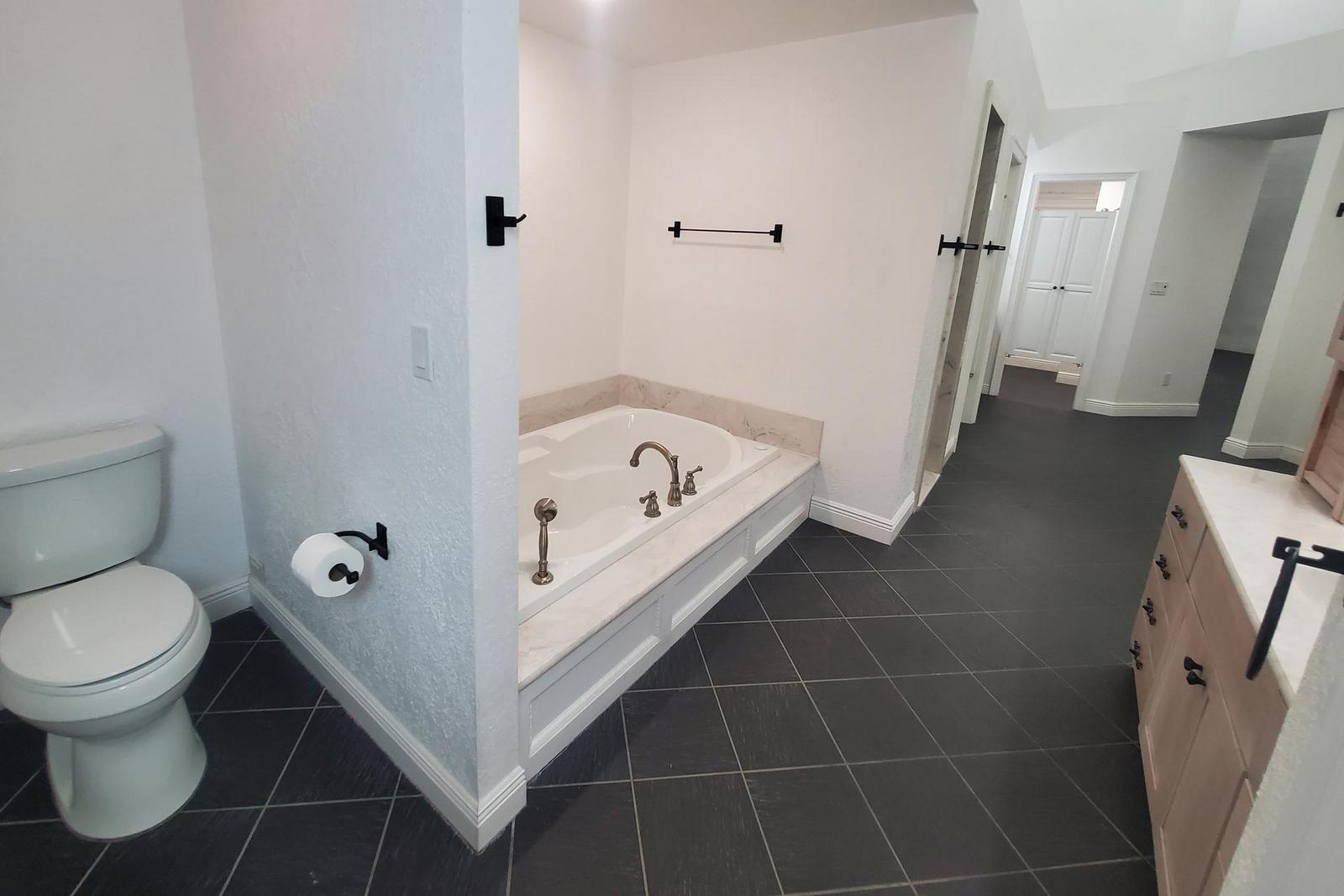 Two-Person Jetted Bathtub in Primary Bathroom.