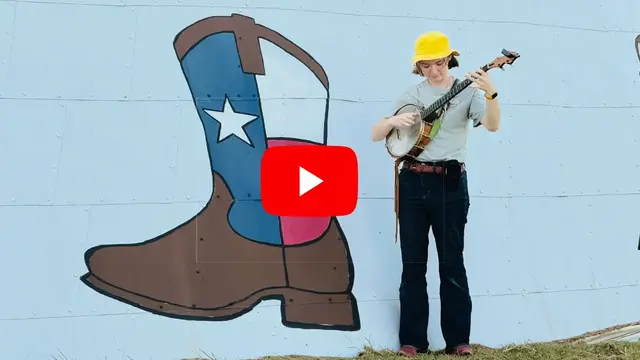 Phoebe Sanders Plays Her Banjo for Bruco, the Famous Texas-Italian Caterpillar Phoebe Sanders Plays Her Banjo for Bruco, the Famous Texas-Italian Caterpillar.